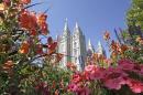 FILE - This Aug. 4, 2015, file photo, flowers bloom in front of the Salt Lake Temple, at Temple Square, in Salt Lake City. In 15 videos posted online Sunday, Oct. 2, 2016, during the final day of the religion's twice-yearly conference, Mormon leaders discussed concerns about the growth of the gay rights movement and heard from a former U.S. senator and church member who tells them the Iraq war could open the door for new converts, according to the footage that pulls back the curtain on a religion that is closely guarded about its inner workings. (AP Photo/Rick Bowmer, File)
