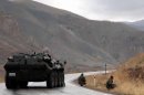 Turkish soldiers block a road near the town of Yuksekova, in the province of Van, eastern Turkey in 2007