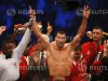 Title holder Klitschko of Ukraine celebrates next to his brother Vitali after defeating contender Thompson of the US during their world heavyweight championship title fight at the Stade de Suisse in Bern