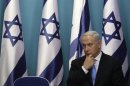 Israel's Prime Minister Benjamin Netanyahu sits after delivering a statement in Jerusalem