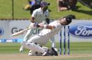 New Zealand's Brendon McCullum ducks a bouncer against India on the fourth day of the second cricket test at Basin Reserve in Wellington, New Zealand, Monday, Feb. 17, 2014. (AP Photo/SNPA, Ross Setford) NEW ZEALAND OUT
