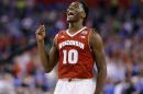 Wisconsin's Nigel Hayes celebrates at the end of an NCAA Final Four tournament college basketball semifinal game against Kentucky Saturday, April 4, 2015, in Indianapolis. Wisconsin won 71-64. (AP Photo/Michael Conroy)