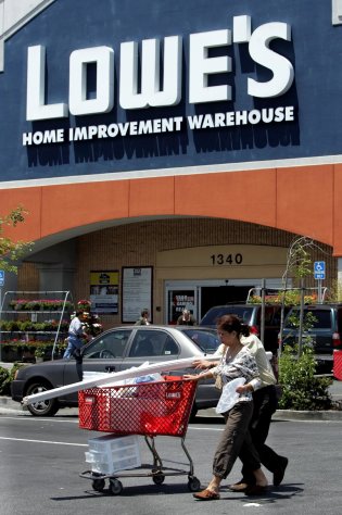 FILE - In this May 22, 2006 file photo, customers leave a Lowe's Home Improvement Warehouse store in San Bruno, Calif. California State Sen. Ted Lieu , D-Torrance, is considering calling for a boycott of Lowe's stores after the home improvement chain pulled its advertising from a reality show about Muslim-Americans. Calling the retail giant's decision "naked religious bigotry," Lieu said Sunday, Dec. 11, 2011, he would also consider legislative action if Lowe's doesn't apologize to Muslims and reinstate its ads. (AP Photo/Paul Sakuma, File)