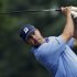 Matt Kuchar watches his tee shot on the 11th hole during the second round of the Colonial golf tournament on Friday, May 24, 2013, in Fort Worth, Texas. (AP Photo/LM Otero)