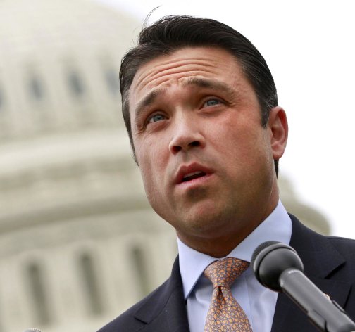 FILE- This May 9, 2012 file photo shows Rep. Michael Grimm, R-N.Y. speaking on Capitol Hill in Washington. The House Ethics Committee announced Monday that Grimm, a former FBI agent, is under investigation for possible campaign finance violations, but said it is deferring the inquiry because of a separate Justice Department probe. (AP Photo/Jacquelyn Martin, File)