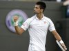Novak Djokovic of Serbia reacts during a quarterfinals match against Florian Mayer of Germany at the All England Lawn Tennis Championships at Wimbledon, England, Wednesday, July 4, 2012. (AP Photo/Kirsty Wigglesworth)