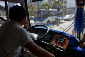 The driver of a public bus travel on a street in Phnom&nbsp;&hellip;