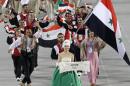 In this photo taken on Friday, Sept. 19, 2014, athletes from Syria march into the stadium during the opening ceremony for the 17th Asian Games in Incheon, South Korea. On the one hand, you have China and India, which account for about a quarter of the world's population. On the other, the Maldives, population 345,000. There's Bhutan, which has been described as the happiest place on Earth, and Syria, which certainly isn't. And for good measure, why not throw in some of the most repressive regimes on the planet -North Korea, Turkmenistan and Uzbekistan? Welcome to the Asian Games, where, as the organizers put it, "Diversity Shines." (AP Photo/Dita Alangkara)