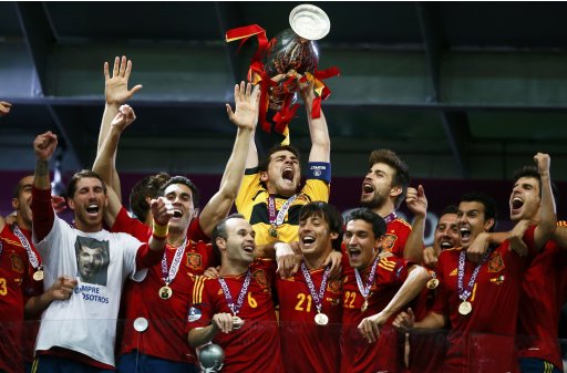 Spain's Casillas lifts up the trophy after defeating Italy to win the Euro 2012 final soccer match at the Olympic stadium in Kiev