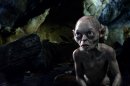 FILE - This publicity file photo released by Warner Bros., shows the character Gollum voiced by Andy Serkis in a scene from the fantasy adventure "The Hobbit: An Unexpected Journey." The superhero blockbusters 