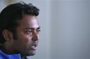 India's tennis player Leander Paes speaks during an interview with Reuters at the Delhi Lawn Tennis Association (DLTA) stadium in New Delhi February 5, 2012