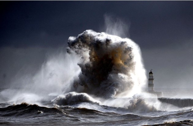 Waves crash against Seaham Harbour, County                        Durham, as snow, bitterly cold temperatures and                        strong winds visit Britain (PA)