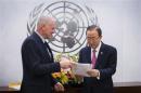 Ake Sellstrom hands his report over to Ban Ki-moon at the United Nations headquarters in