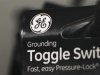 A General Electric Company (GE) logo is seen on a toggle switch package in New York