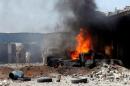 A view of the scene following a car bomb attack in al-Gharbiat in Sirte