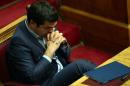 Greek Prime Minister Alexis Tsipras and his radical-left government struck a deal on July 13 with creditors to introduce tough economic reforms in exchange for a bailout