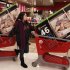 FILE - In this Nov. 25, 2011 file photo, Target customer Nancy, last name not given, guides her shopping carts with televisions purchased at a Target Store in Colma, Calif. In an unexpected twist, TVs are topping many Christmas lists this year. (AP Photo/Jeff Chiu, File)