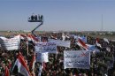 Protesters take part in a demonstration in Ramadi