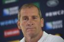 England's head coach Stuart Lancaster attends a press conference at Pennyhill Park hotel near Bagshot, south west of London, on October 4, 2015, a day after England lost their Rugby World Cup 2015 Pool A match against Australia