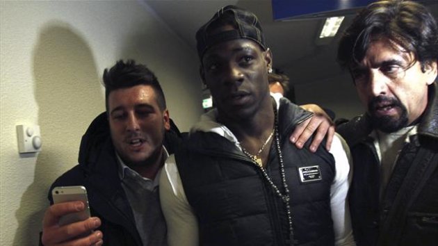 Mario Balotelli arrives in Milan (Reuters)