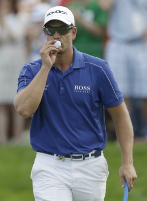 Dufner holds off Furyk at PGA for 1st major title