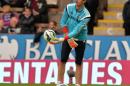 Chelsea's Belgian goalkeeper Thibaut Courtois warms-up ahead of the English Premier League football match between Burnley and Chelsea at Turf Moor in Burnley, north west England on August 18, 2014