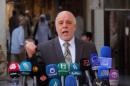 File picture of Iraqi Prime Minister al-Abadi speaks to reporters in the Shiite holy city of Najaf