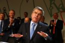 Thomas Bach, of Germany, speaks after being elected the new IOC president during the 125th IOC session in Buenos Aires, Argentina, Tuesday, Sept. 10, 2013. (AP Photo/Alexander Hassenstein, Pool)