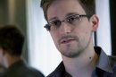 This photo provided by The Guardian Newspaper in London shows Edward Snowden, who worked as a contract employee at the National Security Agency, in Hong Kong, Sunday, June 9, 2013. According to a Department of Justice official on Friday, June 21, 2013, a criminal complaint has been filed against Snowden in the NSA surveillance case. (AP Photo/The Guardian) MANDATORY CREDIT