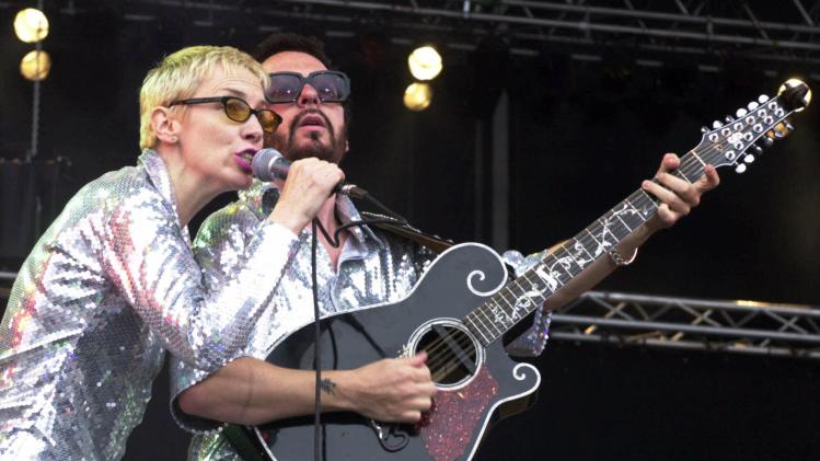 File- This June 10, 2000, file photo shows Annie Lennox, left, and Dave Stewart as the Eurythmics performing on stage at the Rock at the Ring three-day music festival at the Nuerburgring race circuit in Nuerburg, Germany. The Eurythmics are reuniting to pay tribute to the Beatles. The Recording Academy announced Monday Jan. 6, 2014, that Lennox and Stewart will perform as a duo for &quot;The Night That Changed America: A Grammy Salute To The Beatles.” The event will tape at the Los Angeles Convention Center on Jan. 27, a day after the Grammy Awards. (AP Photo/Pool)