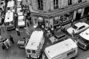Firemen and rescuers work in the rue des Rosiers after the French-Jewish delicatessen restaurant Jo Goldenberg was attacked in Paris by gunmen, on August 9, 1982