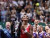 Serena Williams of the U.S. celebrates with the trophy after her victory against Russia's Sharapova after their final WTA tennis championships match in Istanbul