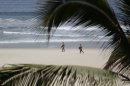 Mexican soldiers patrol the beach of San Jose del Cabo in Mexico's Baja Peninsula, Sunday, June 17, 2012. The G-20 summit starts in Los Cabos on Monday. (AP Photo/Eduardo Verdugo)