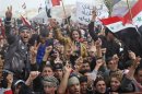 Protesters take part in a demonstration in Ramadi
