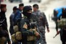 File picture shows Iraqi security forces at the site of a suicide bombing south of the capital Baghdad