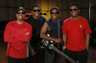 FILE - This June 12, 2012 file photo shows, from left, Marlon Jackson, Jackie Jackson, Tito Jackson and Jermaine Jackson during a rehearsal in Burbank, Calif. Nearly three years after Michael Jackson died while staging his comeback, four of his brothers - Marlon, Jermaine, Tito and Jackie - are preparing for their own return to the stage. (Photo by Todd Williamson/Invision/AP)