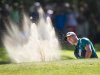 German's Martin Kaymer plays a shot out of the bunker of the 14th hole of the Dutch Open Golf Tournament in Hilversum