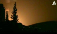 In this image taken from video obtained from Shaam News Network, which has been authenticated based on its contents and other AP reporting, smoke and fire fill the skyline over Damascus, Syria, early Sunday, May 5, 2013 after an Israeli airstrike. Israeli warplanes struck areas in and around the Syrian capital Sunday, setting off a series of explosions as they targeted a shipment of highly accurate, Iranian-made guided missiles believed to be on their way to Lebanon's Hezbollah militant group, officials and activists said. The attack, the second in three days, signaled a sharp escalation of Israel's involvement in Syria's bloody civil war. Syria's state media reported that Israeli missiles struck a military and scientific research center near the Syrian capital and caused casualties. (AP Photo/Shaam News Network via AP video)