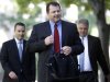 Former Major League Baseball pitcher Roger Clemens, center, arrives at federal court in Washington in Washington, Thursday, May 24, 2012. (AP Photo/Charles Dharapak)