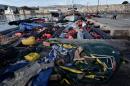 Confiscated rafts that carried migrants to the Greek island of Kos from Turkey are seen in the port of the town of Kos on August 15, 2015