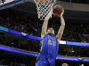 Florida Gulf Coast's Chase Fieler goes up for a dunk against Georgetown's Jabril Trawick during the second half of a second-round game of the NCAA college basketball tournament, Friday, March 22, 2013, in Philadelphia. (AP Photo/Matt Rourke)