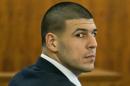 Former New England Patriots player Aaron Hernandez listens during his murder trial at the Bristol County Superior Court in Fall River
