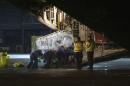 An Ebola patient is put on a Hercules transport plane at Glasgow Airport in Scotland