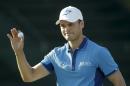 Martin Kaymer, of Germany, waves after shooting 65 in the first round of the U.S. Open golf tournament in Pinehurst, N.C., Thursday, June 12, 2014. (AP Photo/David Goldman)