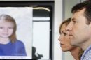 Kate and Gerry McCann are seen in front of a computer generated image of how their missing daughter Madeleine might look now, during a news conference in London