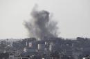 Smoke rises following what witnesses said was an Israeli air strike in Gaza