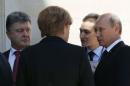 Putin, Poroshenko and Merkel talk in Benouville