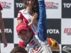 Takuma Sato of Japan celebrates after winning the IndyCar Series' Long Beach Grand Prix auto race, Sunday, April 21, 2013, in Long Beach, Calif. (AP Photo/Ringo H.W. Chiu)