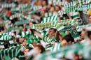 Celtic supporters singing before a match at Celtic Park in Glasgow, Scotland on May 24, 2009