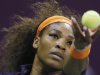 Williams of the U.S. serves the ball to Azarenka of Belarus during the final match at the Qatar Open tennis tournament in Doha